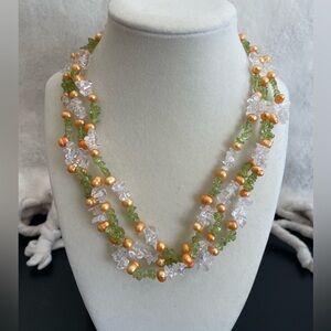 17” three strand necklace with orange pearls, peridot and clear quartz. New
